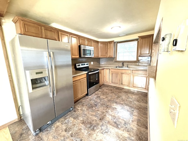 6 Stirling Ct, Middletown, CT 06457 - kitchen featuring light countertops, a sink, stainless steel appliances, and decorative backsplash
