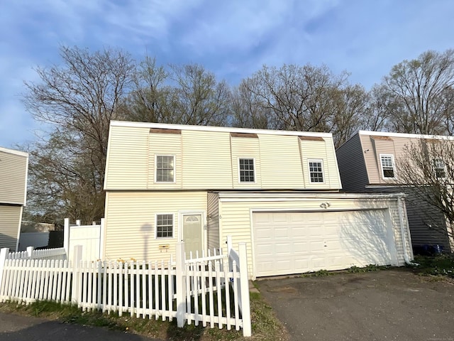 6 Stirling Ct, Middletown, CT 06457 - view of front of property featuring driveway, fence private yard, and a garage