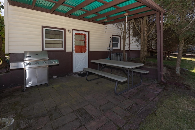 view of patio featuring outdoor dining space and area for grilling