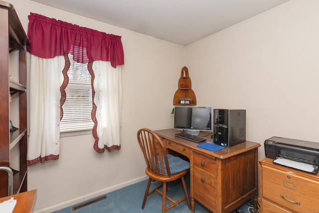office with baseboards, carpet flooring, and visible vents
