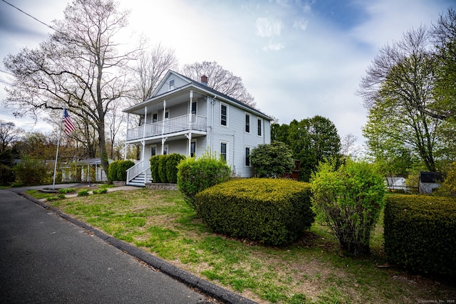 30 Merrimac St, Watertown, CT 06779 - view of front facade featuring a chimney and a balcony