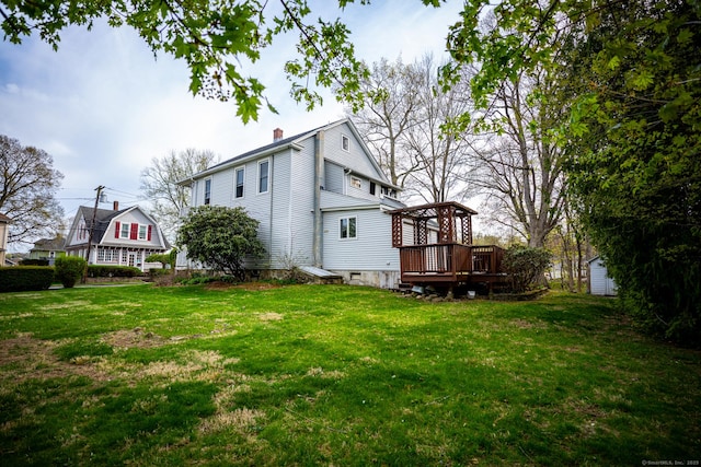 30 Merrimac St, Watertown, CT 06779 - view of property exterior with a wooden deck, a yard, and a chimney