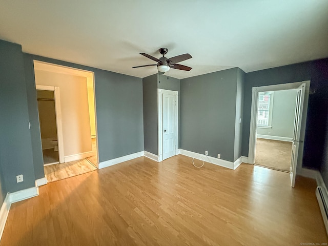 30 Merrimac St, Watertown, CT 06779 - unfurnished bedroom with baseboards, wood finished floors, ceiling fan, and ensuite bath