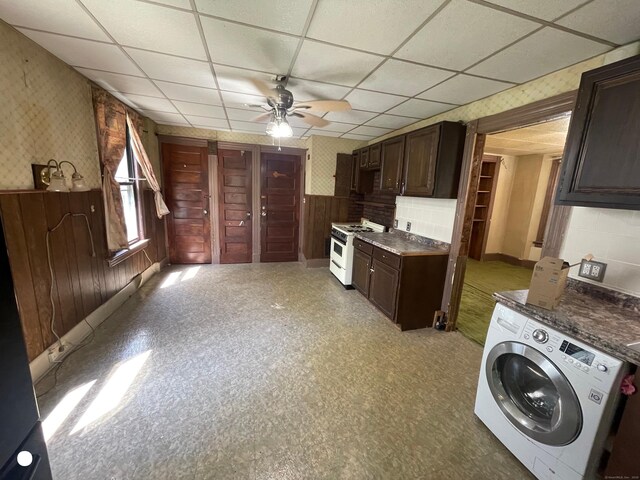 408 Blohm St, West Haven, CT 06516 - kitchen featuring a ceiling fan, washer / dryer, white range with gas cooktop, and a drop ceiling