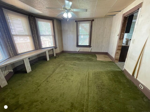 408 Blohm St, West Haven, CT 06516 - carpeted empty room featuring baseboards, ceiling fan, and a drop ceiling