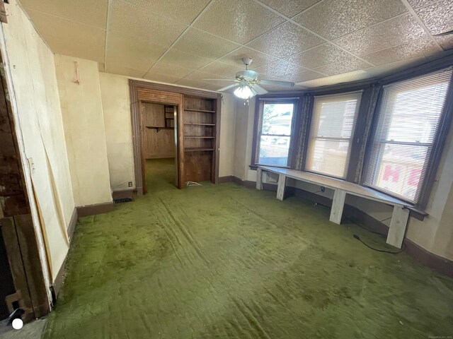 408 Blohm St, West Haven, CT 06516 - interior space featuring a ceiling fan, baseboards, and carpet
