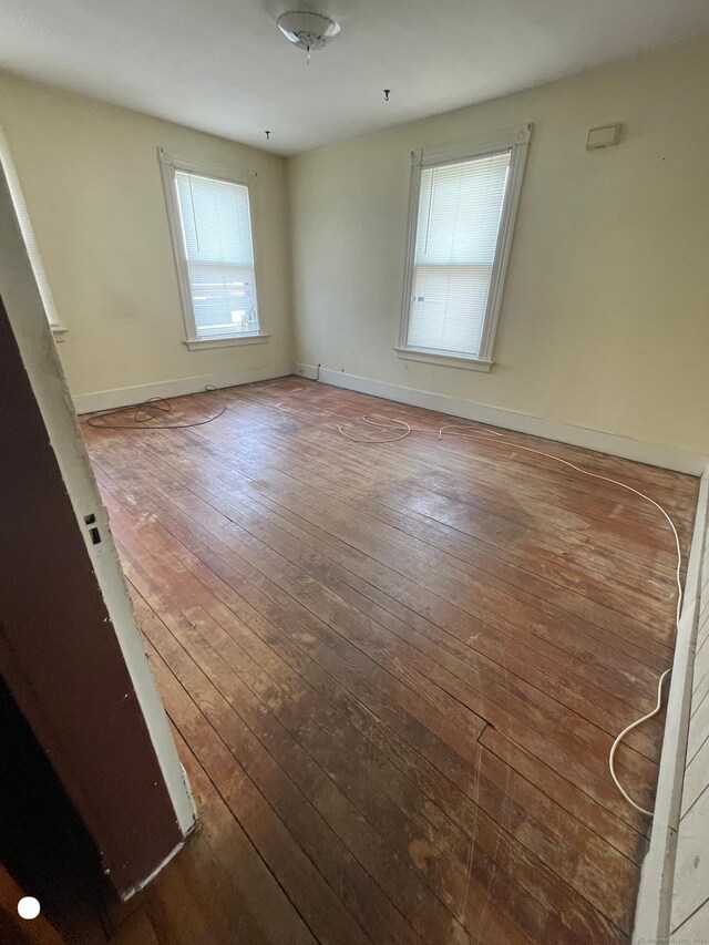 408 Blohm St, West Haven, CT 06516 - empty room featuring baseboards and wood-type flooring