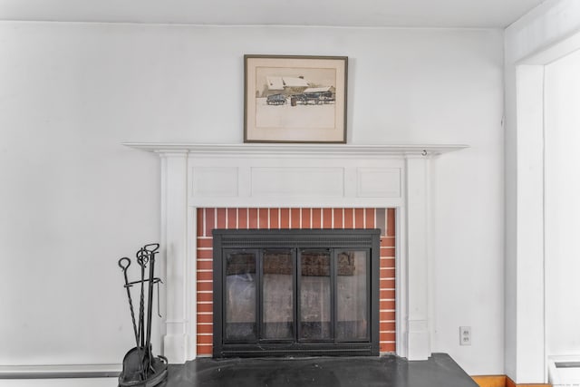 interior details featuring a fireplace