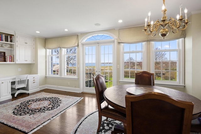 828 Sasco Hill Rd, Fairfield, CT 06824 - dining area with a chandelier, dark wood-style flooring, ornamental molding, baseboards, and recessed lighting