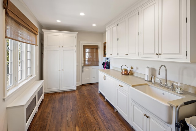 828 Sasco Hill Rd, Fairfield, CT 06824 - kitchen with a sink, light countertops, white cabinets, dark wood-style floors, and recessed lighting