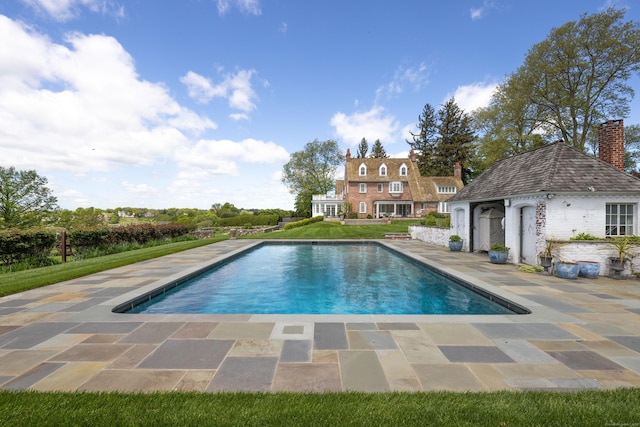 828 Sasco Hill Rd, Fairfield, CT 06824 - swimming pool featuring a patio area and a lawn