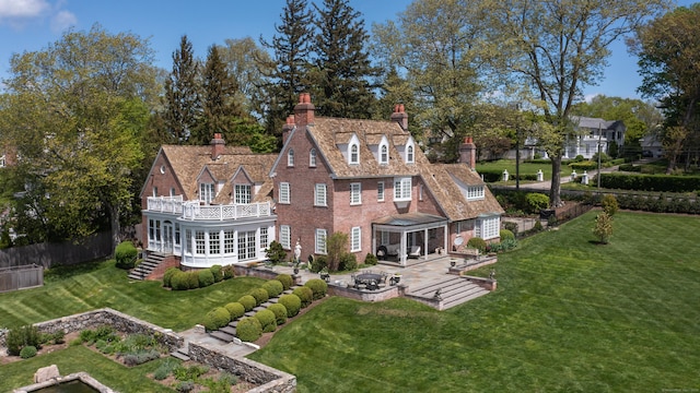 828 Sasco Hill Rd, Fairfield, CT 06824 - rear view of property featuring a chimney, a balcony, a patio area, and french doors