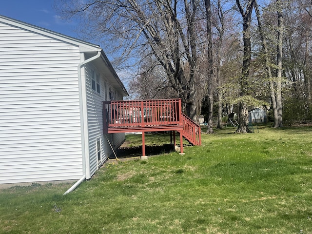 view of yard with a wooden deck