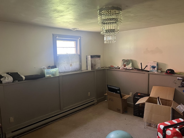 interior space featuring a baseboard heating unit and light colored carpet