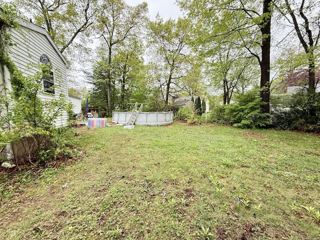 5 Hampton Rd, Enfield, CT 06082 - view of green lawn with an outdoor pool