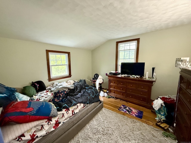 5 Hampton Rd, Enfield, CT 06082 - bedroom featuring wood finished floors, vaulted ceiling, and a textured ceiling