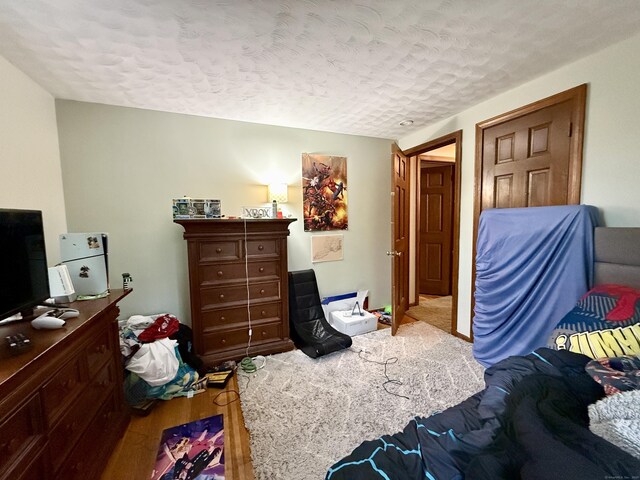 5 Hampton Rd, Enfield, CT 06082 - bedroom with wood finished floors and a textured ceiling