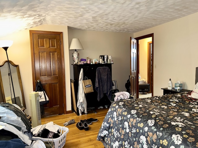 5 Hampton Rd, Enfield, CT 06082 - bedroom with a textured ceiling and wood finished floors