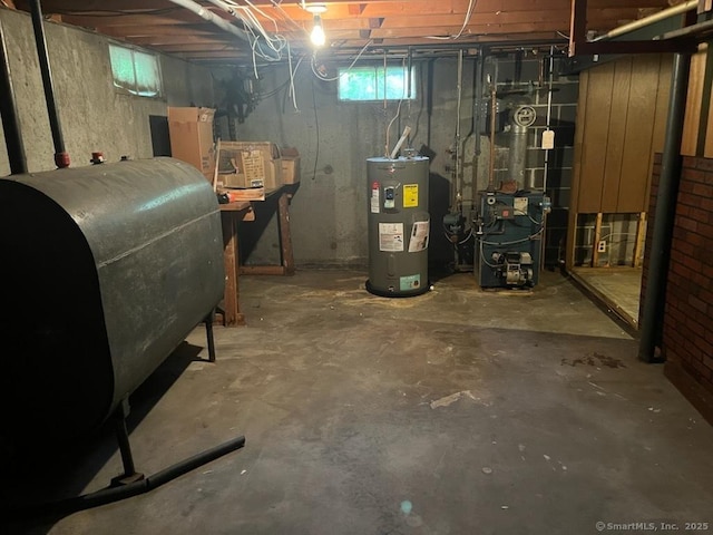 5 Hampton Rd, Enfield, CT 06082 - below grade area featuring oil tank, electric water heater, and a heating unit
