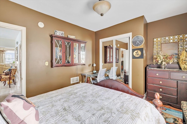 bedroom featuring visible vents