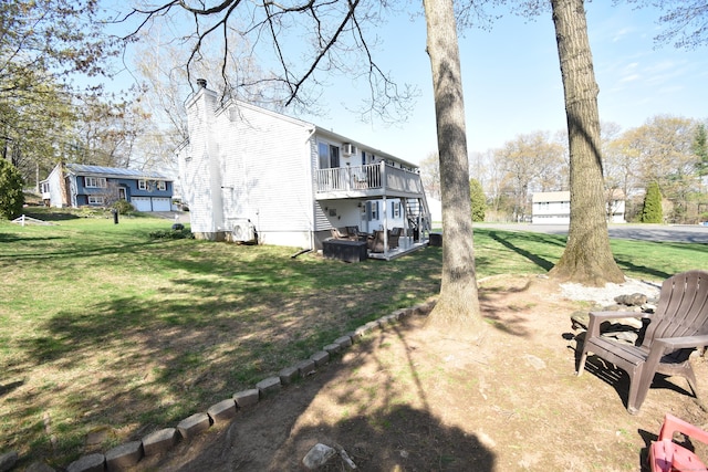 view of yard with a wooden deck