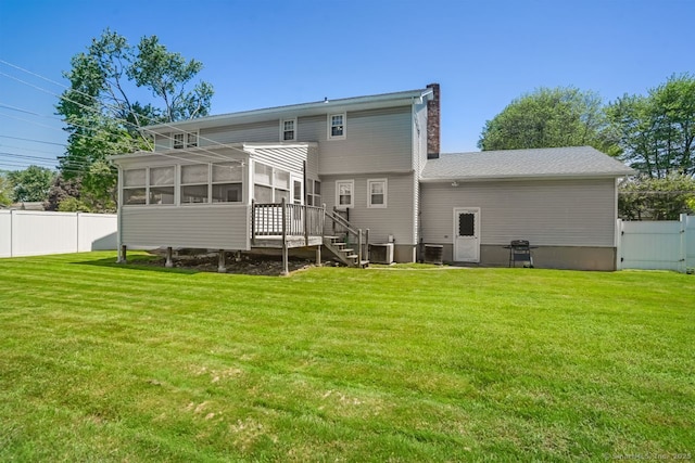 330 Flagler Ave, Stratford, CT 06614 - back of house with a sunroom, stairway, a chimney, cooling unit, and a deck