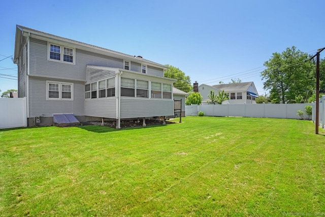 330 Flagler Ave, Stratford, CT 06614 - rear view of property with a sunroom