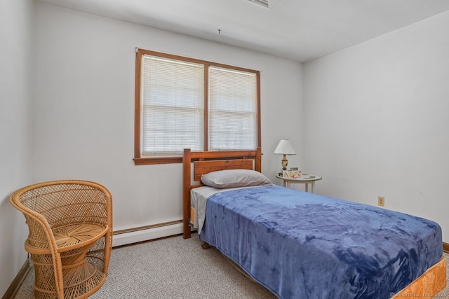 330 Flagler Ave, Stratford, CT 06614 - bedroom featuring a baseboard radiator, baseboards, and carpet
