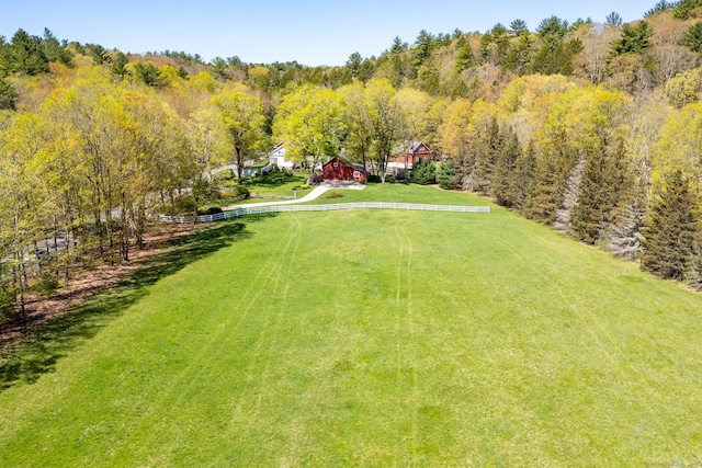 view of yard with a forest view