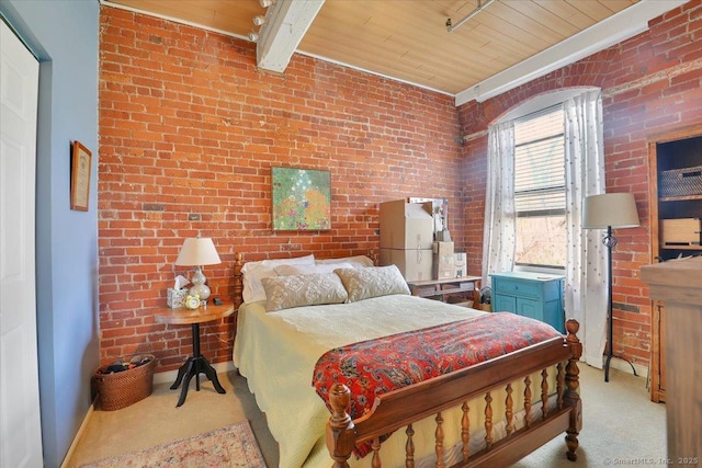 bedroom with wood ceiling, brick wall, carpet flooring, and baseboards