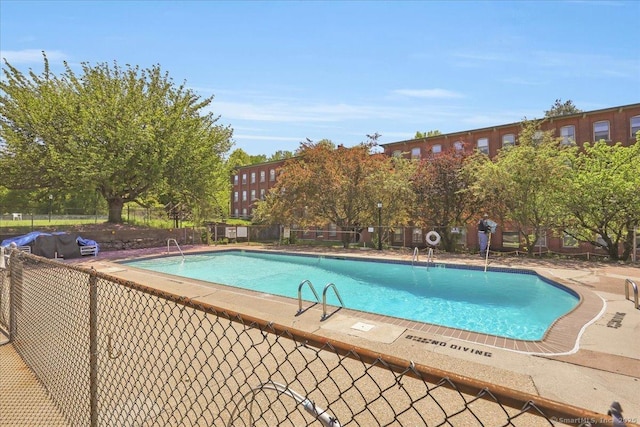 pool featuring fence