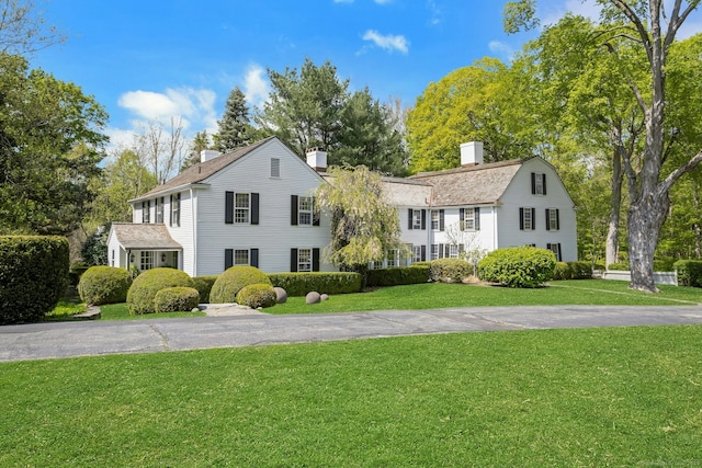 35 Old Redding Rd, Easton, CT 06612 - view of front of home featuring a chimney and a front lawn