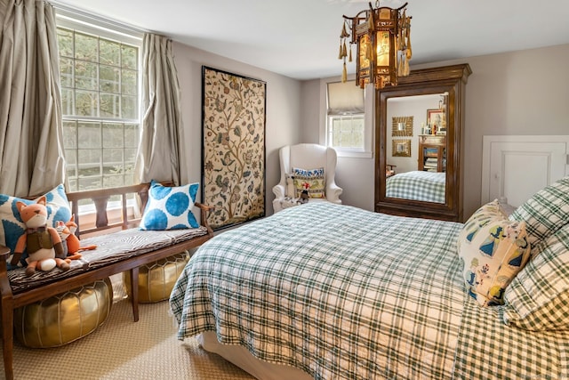 35 Old Redding Rd, Easton, CT 06612 - bedroom featuring multiple windows and a chandelier