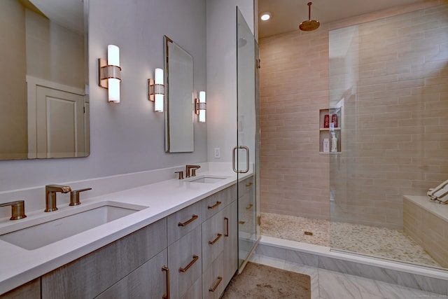 full bath with recessed lighting, a stall shower, double vanity, and a sink