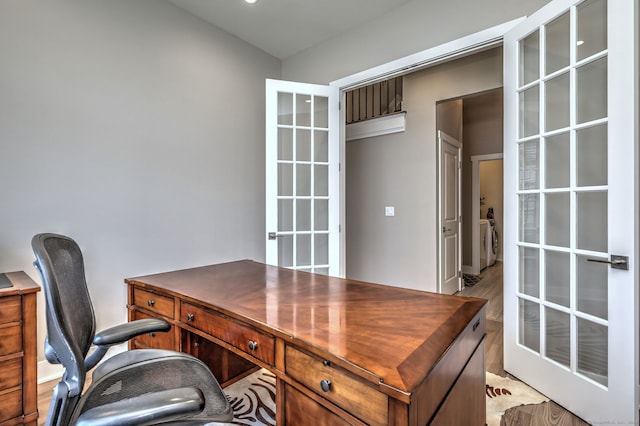 office area with french doors and washing machine and clothes dryer