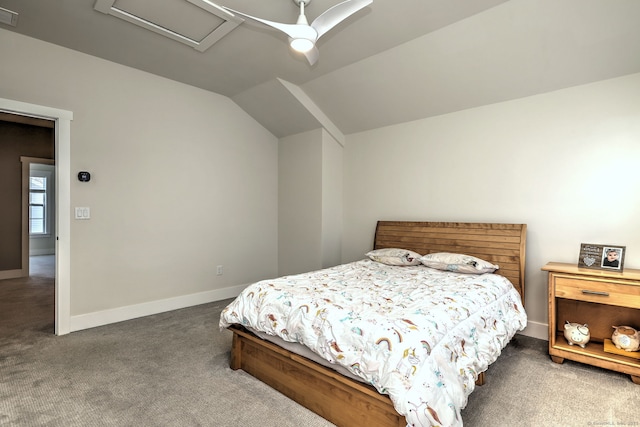 bedroom with attic access, carpet flooring, visible vents, baseboards, and lofted ceiling