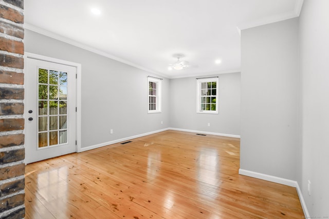 61 Longview Ave, Fairfield, CT 06824 - empty room with crown molding, baseboards, visible vents, and light wood-type flooring