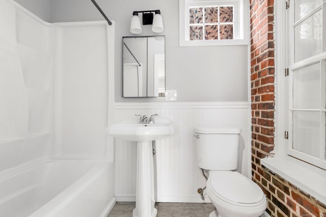 61 Longview Ave, Fairfield, CT 06824 - full bathroom with toilet, shower / washtub combination, a sink, and a wainscoted wall