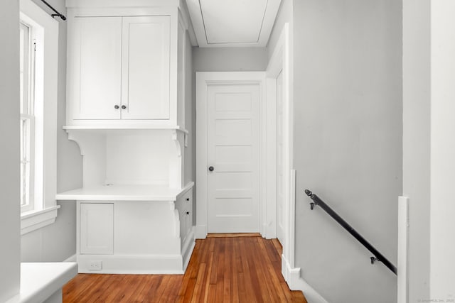 61 Longview Ave, Fairfield, CT 06824 - hallway with wood-type flooring, baseboards, an upstairs landing, and attic access
