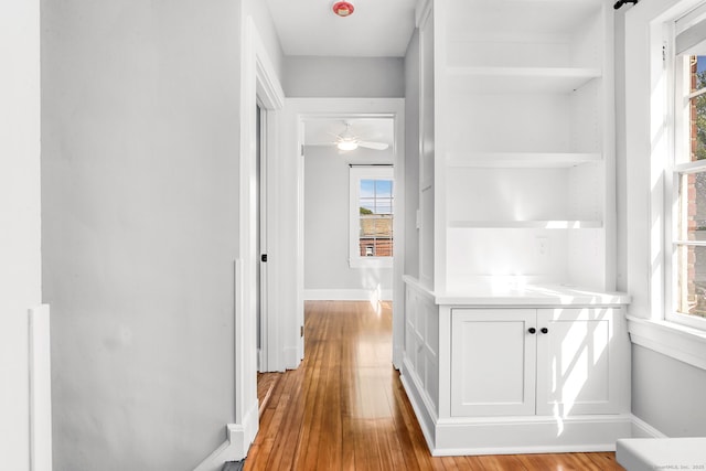 61 Longview Ave, Fairfield, CT 06824 - hall featuring baseboards, plenty of natural light, and light wood-style flooring