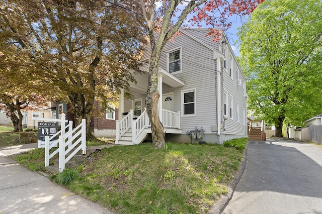 6 Beech St, Bristol, CT 06010 - view of front of home featuring fence and a porch