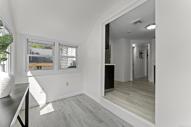 6 Beech St, Bristol, CT 06010 - hallway with visible vents, baseboards, and wood finished floors