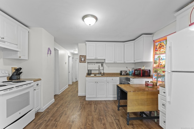 6 Beech St, Bristol, CT 06010 - kitchen featuring white appliances, white cabinets, under cabinet range hood, and a sink