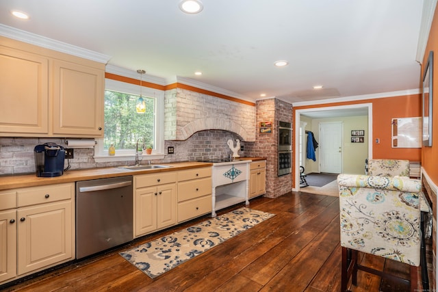kitchen with dark wood-style floors, a sink, wood counters, backsplash, and stainless steel appliances