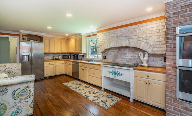 kitchen featuring open shelves, a sink, tasteful backsplash, dark wood-style floors, and black appliances