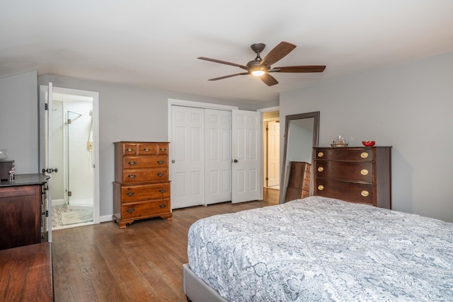 bedroom with baseboards, ceiling fan, wood finished floors, and a closet