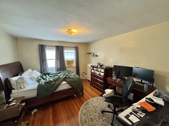 78-80 Lancaster Rd, West Hartford, CT 06119 - bedroom featuring a textured ceiling, wood finished floors, and cooling unit