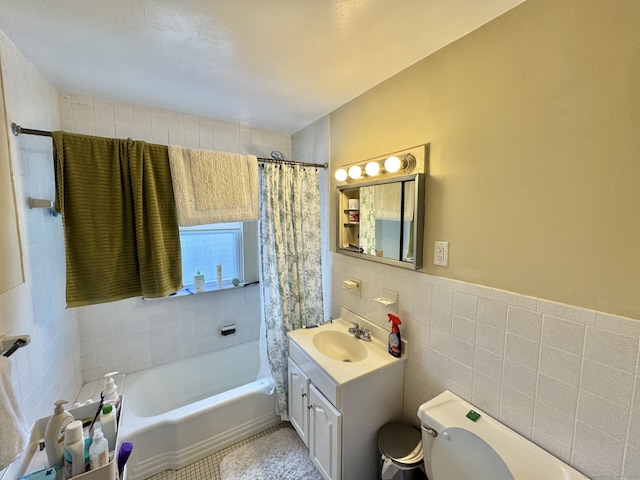 78-80 Lancaster Rd, West Hartford, CT 06119 - full bath with vanity, wainscoting, toilet, tile walls, and shower / tub combo