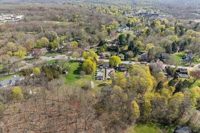 drone / aerial view with a view of trees