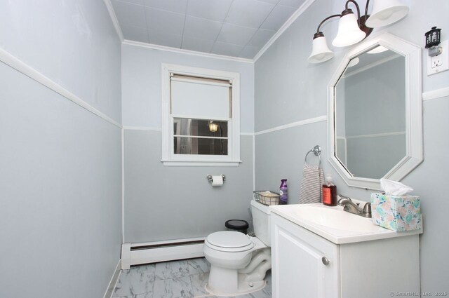 bathroom featuring a baseboard radiator, vanity, ornamental molding, and marble finish floor